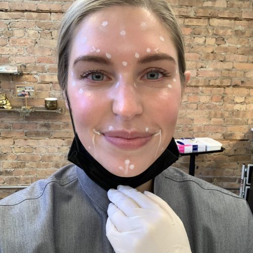 elizabeth russeau using facial skin care product